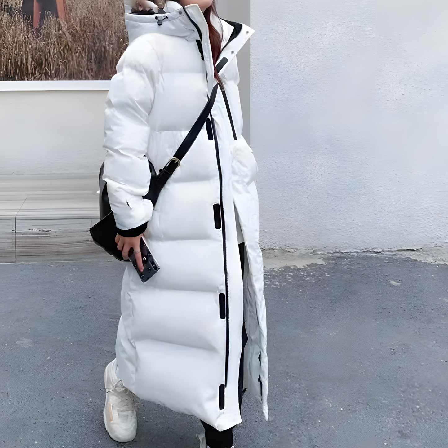 Winddichte lange Daunenjacke